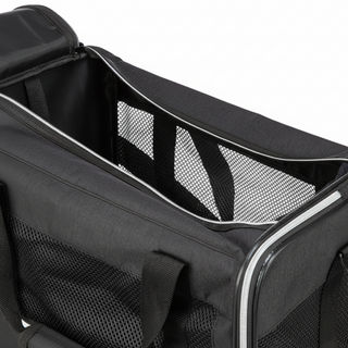 Black pet carrier with mesh sides on a white background