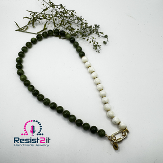 Close-up detail of green jade gemstone beads and trochus shell on Midnight Reflections necklace