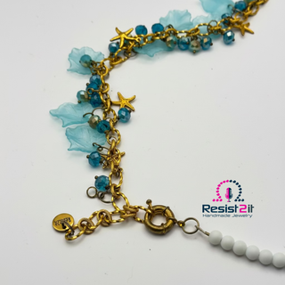 Coastal statement necklace with starfish and fish charms by Resist2it