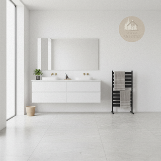 AUREA™ Electric Heated Towel Rail – 10 bars standing on the floor of a large modern white bathroom