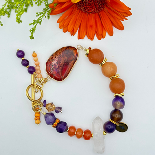 BIG ORANGES™ handmade beaded bracelet in purple and orange colors, with amethyst, agate and a crystal .
