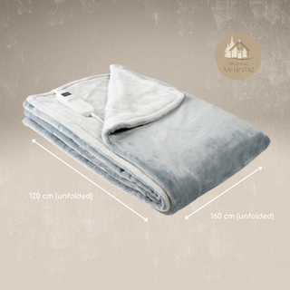 Folded COCOON™ – Electric Throw with dimensions on a beige background, featuring the brand My House My Home.