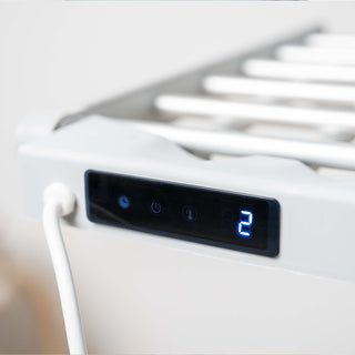 Detail of the touchscree of the DRYFLY™ – Foldable electric drying rack / clothes dryer with wings, touchscreen, timer, and temperature control