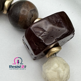 Detail of horse-themed bracelet with brown natural stone beads - unique handmade bracelet from Belgium by
Resist2it.