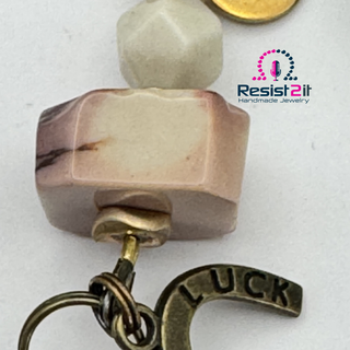 Detail of horse-themed bracelet with brown natural stone beads - unique handmade bracelet from Belgium by
Resist2it.