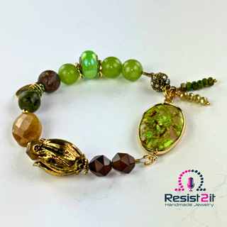 Handcrafted green statement bracelet with faceted natural stones and matte finish