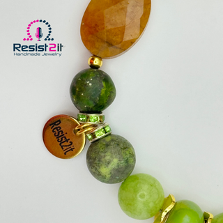 Close-up detail of ON THE GREEN bracelet showing lime green sea sediment stone connector