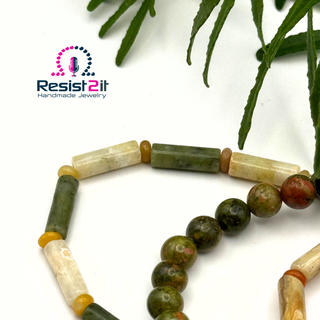 Close-up unakite agate aventurine beads Beadalon wire men’s bracelet with branding Resist2it logo