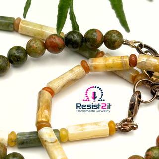 Set of beaded bracelet with natural stones beads and stone tubes, featuring Resist2it logo.