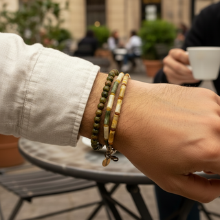 Close-uo of the wrist of a man wearing EARTH ANCHOR men’s bracelet set with unakite agate and aventurine by Resist2it