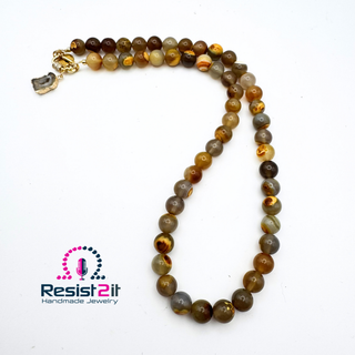 Total view of UNSPOKEN™ Tiger Skin Agate Necklace with detachable agate slice pendant