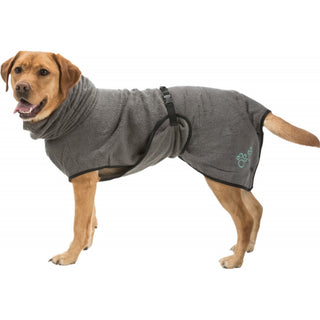 Dog wearing a gray fleece coat with a brand logo on a white background